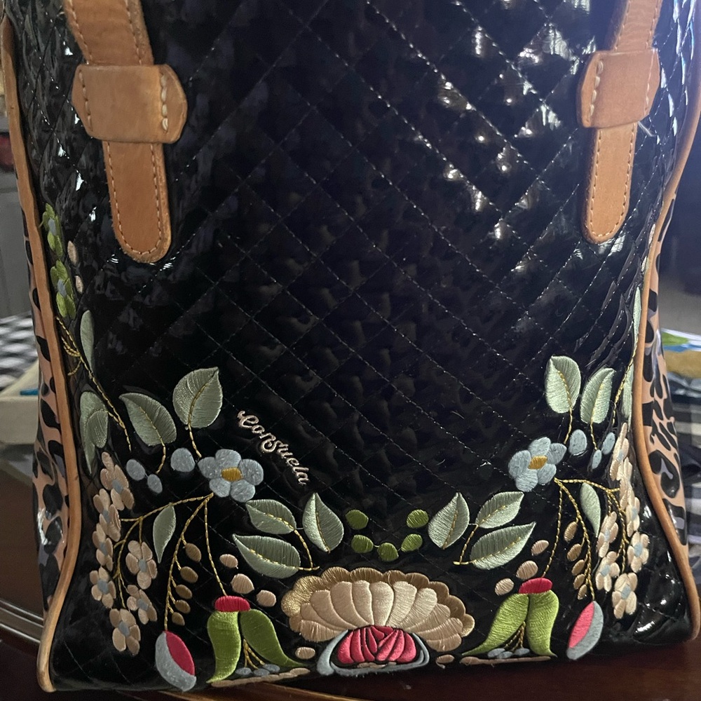 Consuela tote it’s large enough to carry a laptop and folders